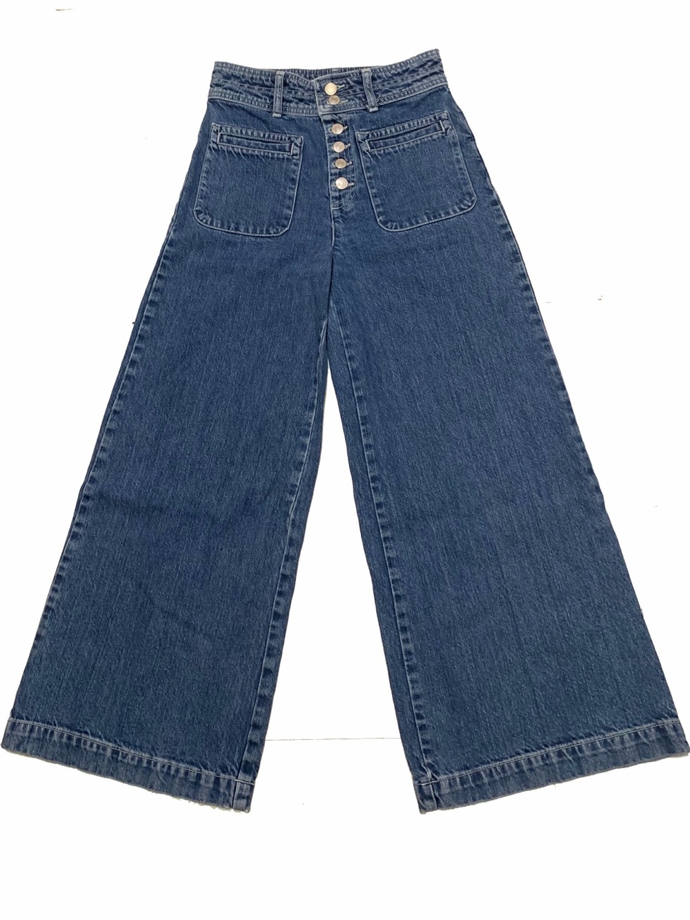 25 / We The Free high-rise denim jeans feature a wide-leg cut and  button-fly